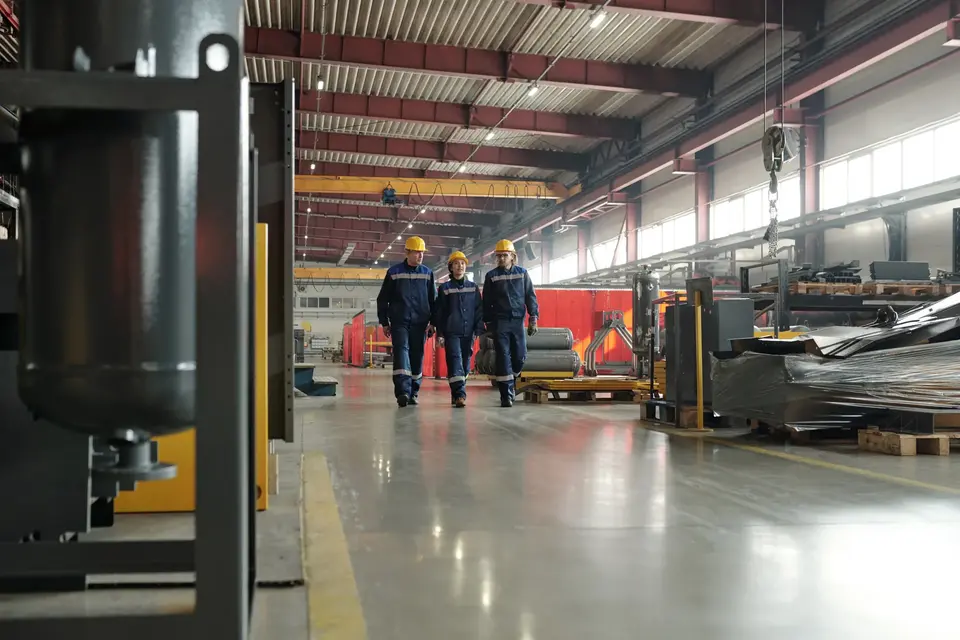 Staff walking through a manufacturing facility